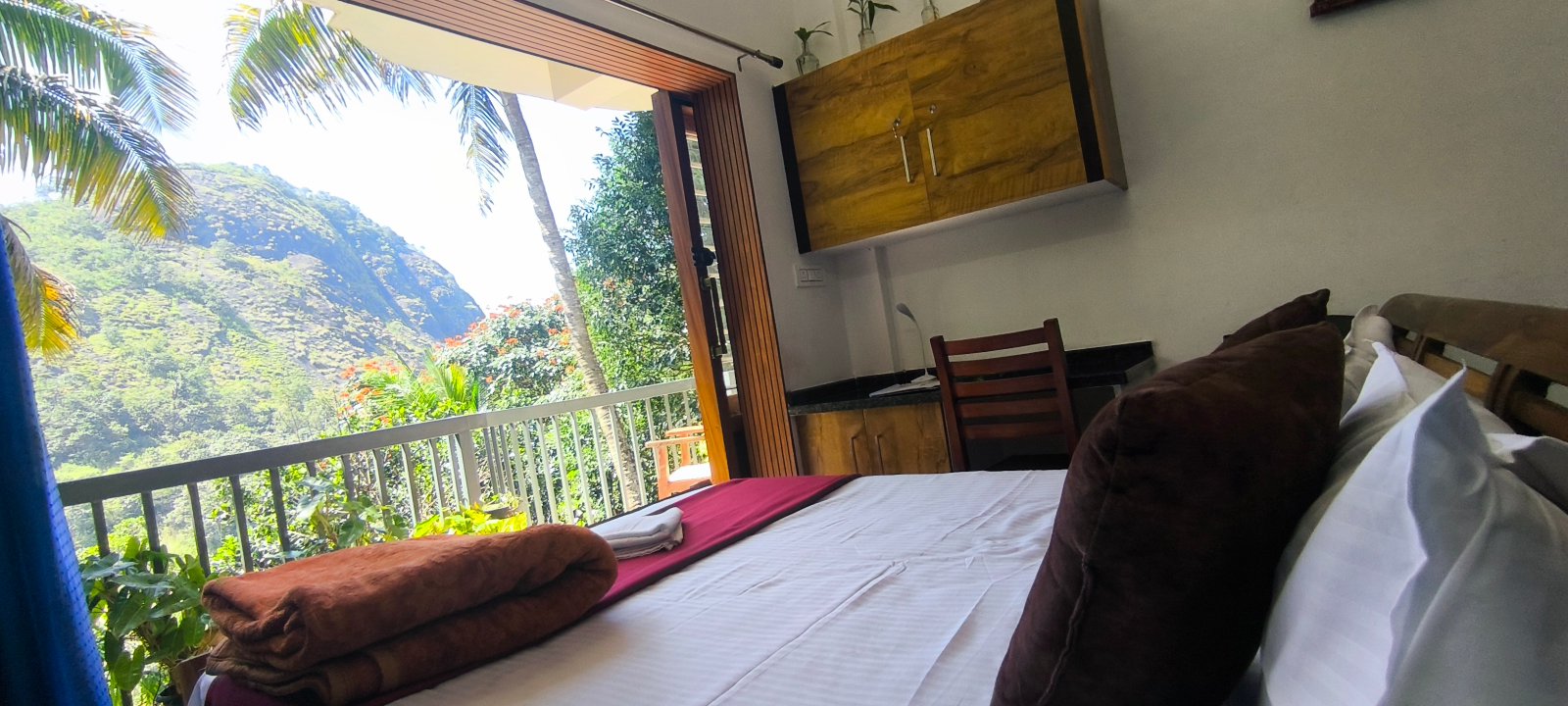 Family cottage room with hill view